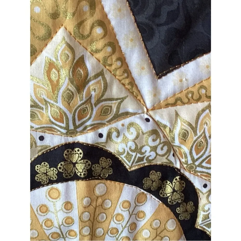 NWT. Gold and Black Star Lap Quilt